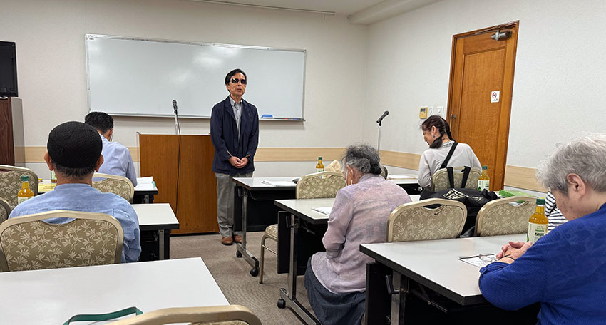 開会の挨拶をする田中雄二会長